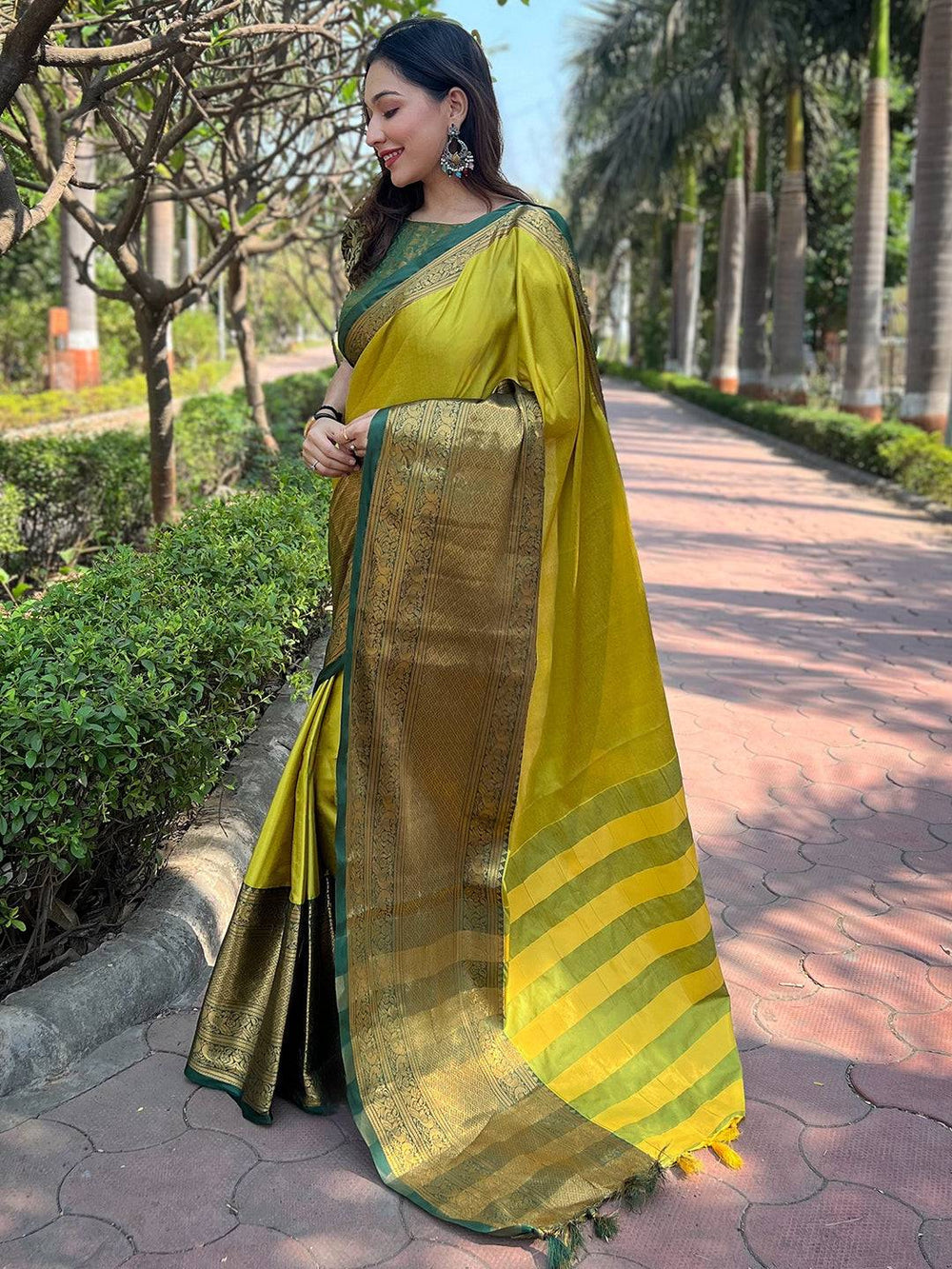 Elegant light green Kanjivaram saree with traditional motifs