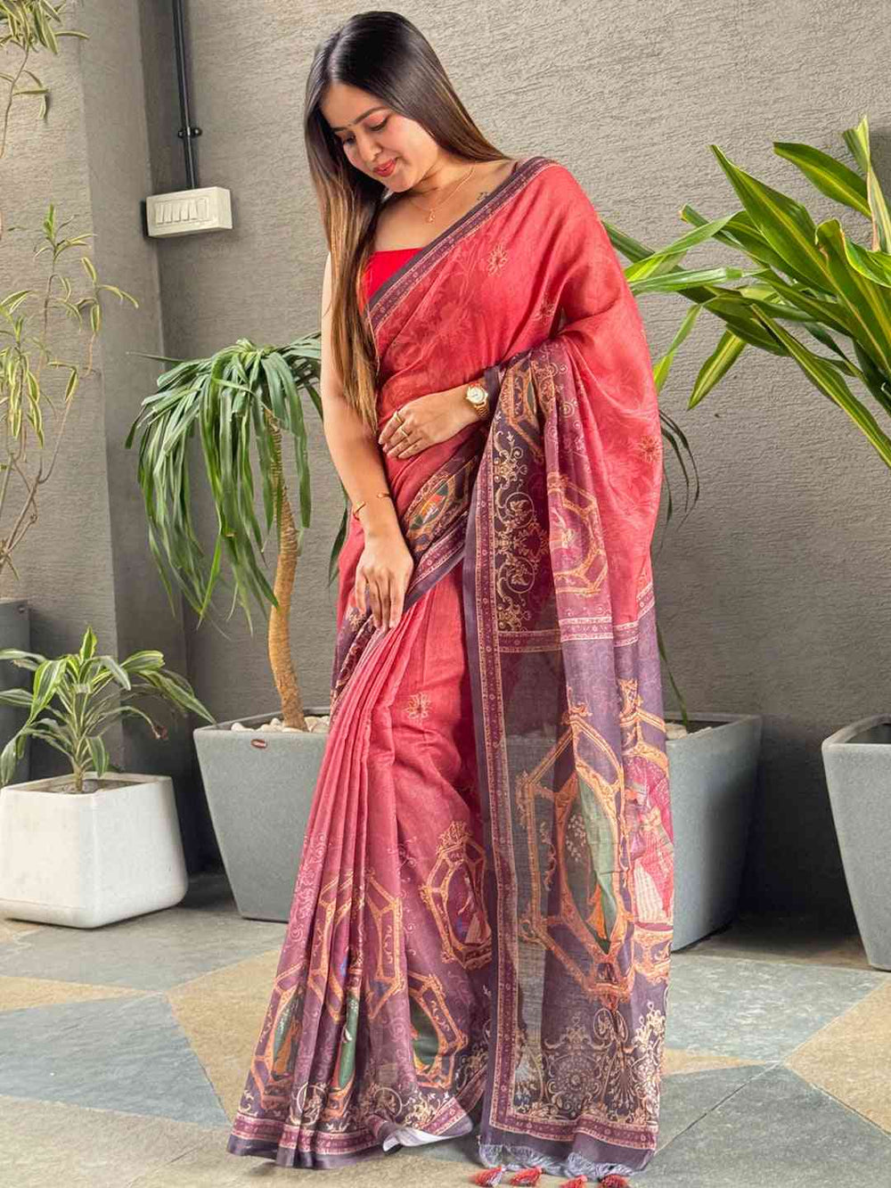 Red colour linen saree with digital print and detailed border