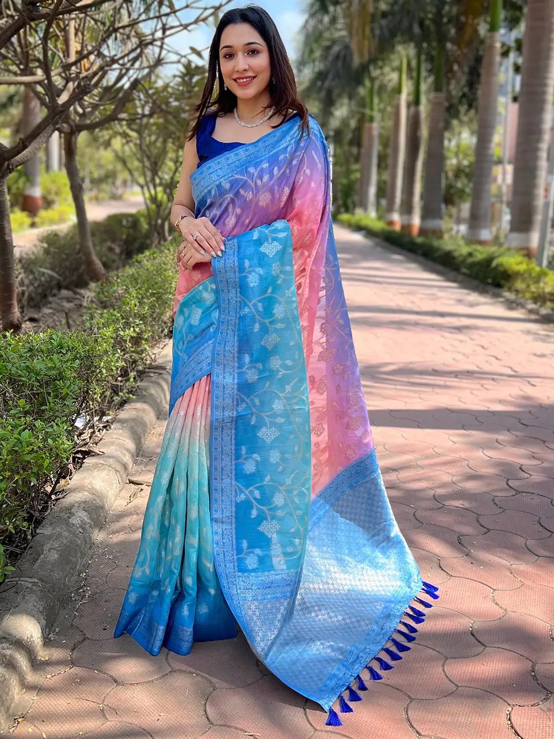 Model wearing multi-color slub silk saree with Lakhnavi weaving