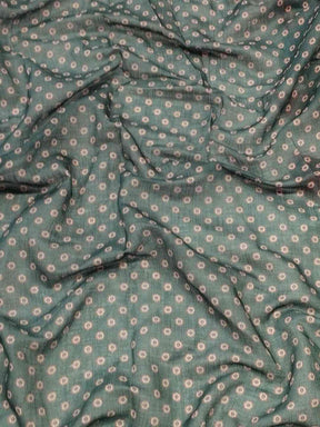 Close-up of Gajari Ikkat saree fabric with pattern