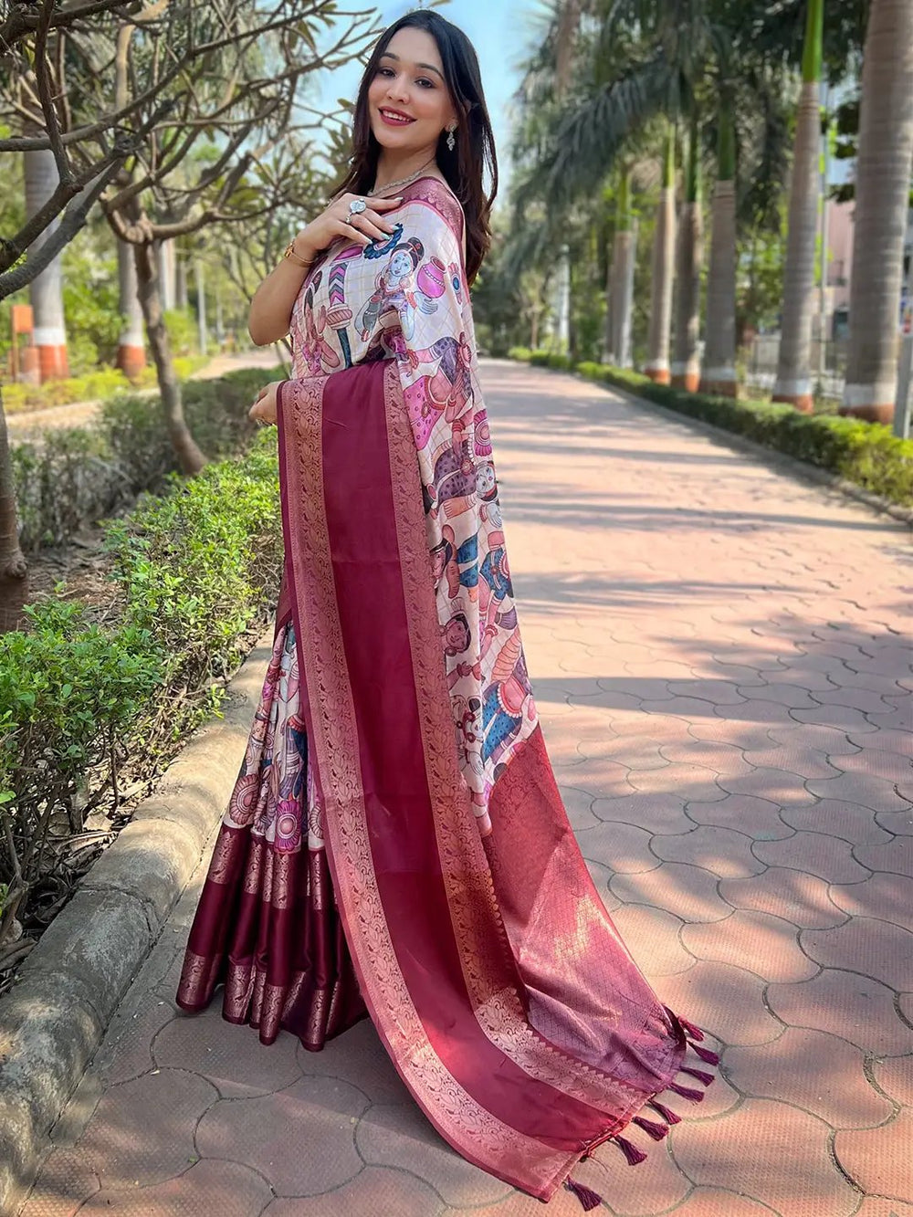 Side view of woman in off-white Banarasi silk saree