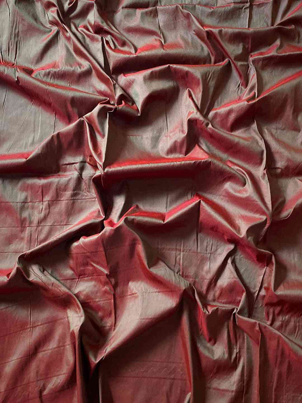 Fabric texture of Royal Red Paithani saree with zari weave.