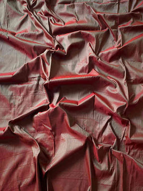 Fabric texture of Royal Red Paithani saree with zari weave.