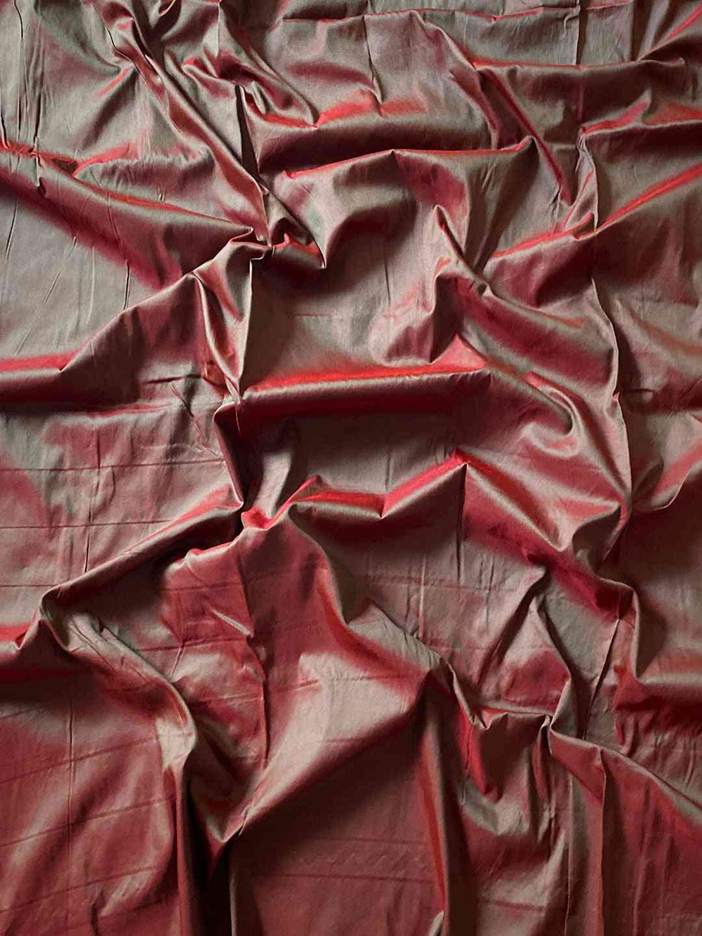 Fabric texture of Royal Red Paithani saree with zari weave.