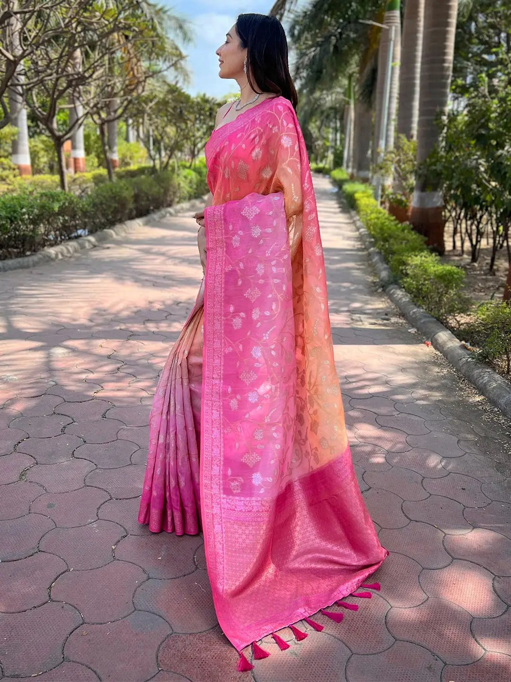 Side view of pink slub silk saree with intricate weaving