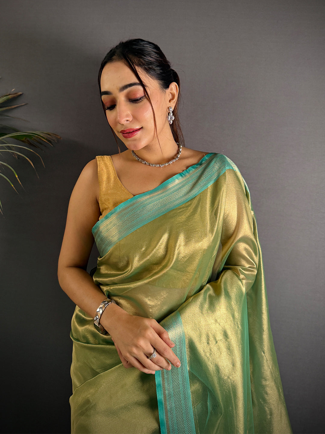 Radiant Sky Blue Gold Zari Tissue Saree