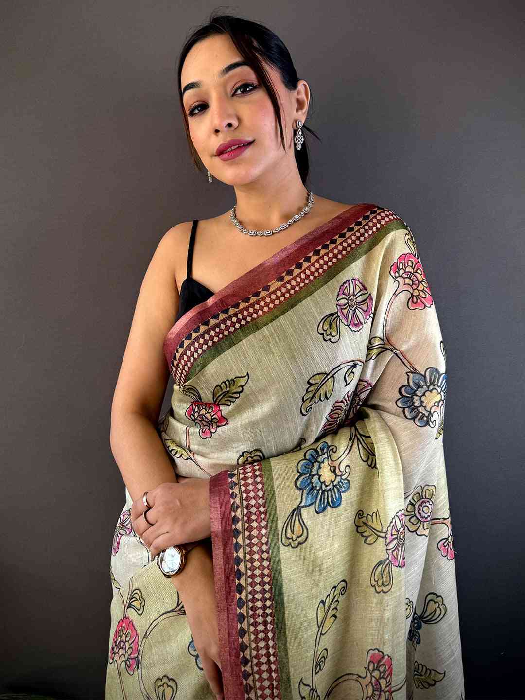 Swamp Green Zari Tussar Floral Saree with intricate floral prints and zari detailing, draped elegantly for a sophisticated traditional look.
