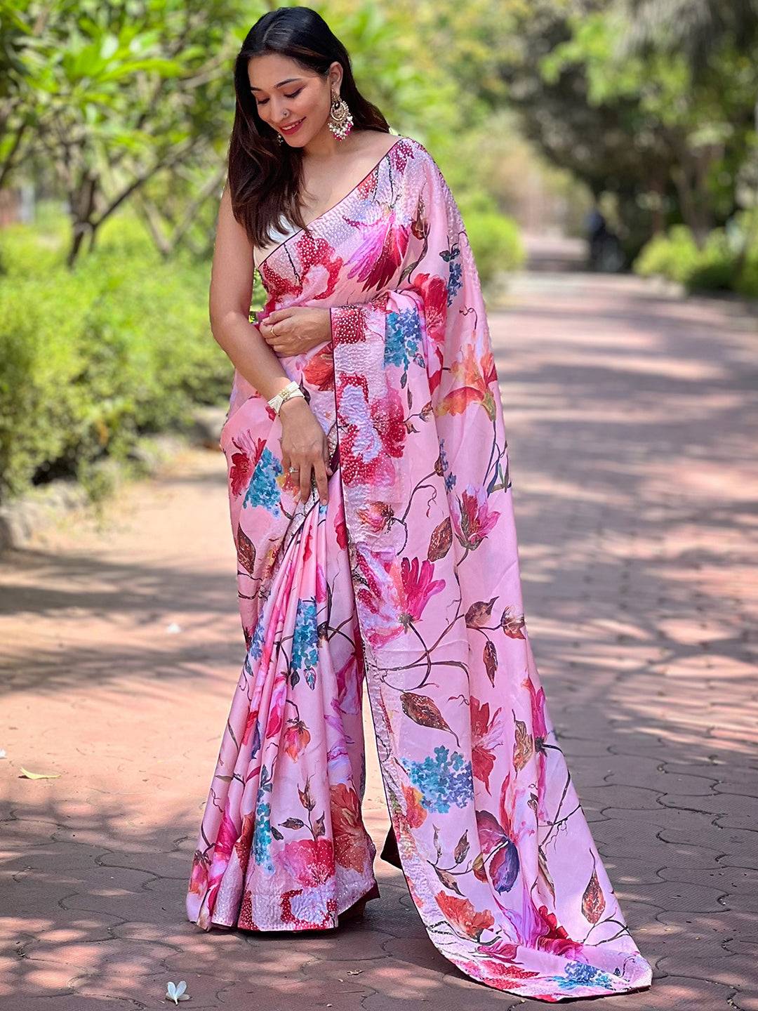 Full view of satin georgette peach floral saree on model