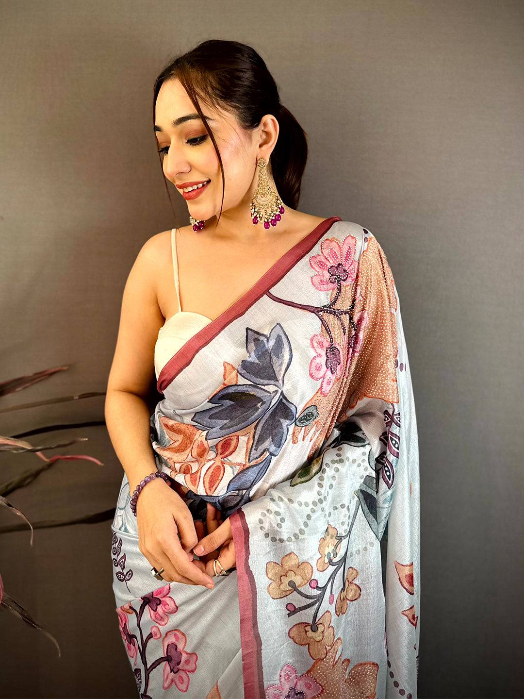 Light Blue Stone Work Floral Chinnon Saree
