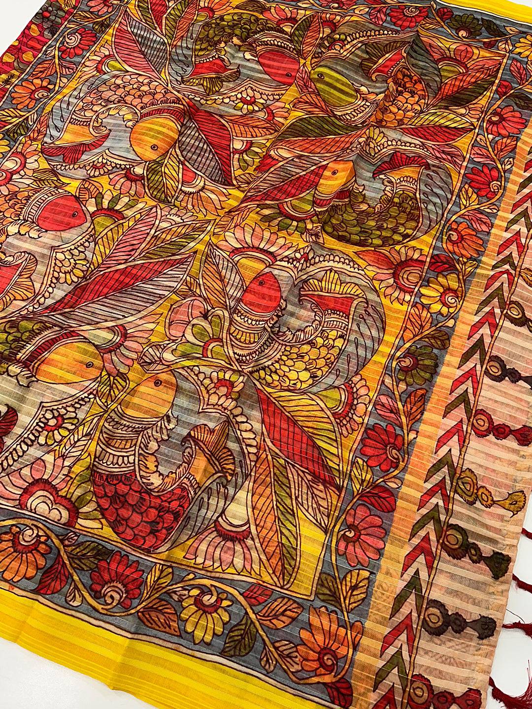 Intricate Kalamkari artwork on saree fabric