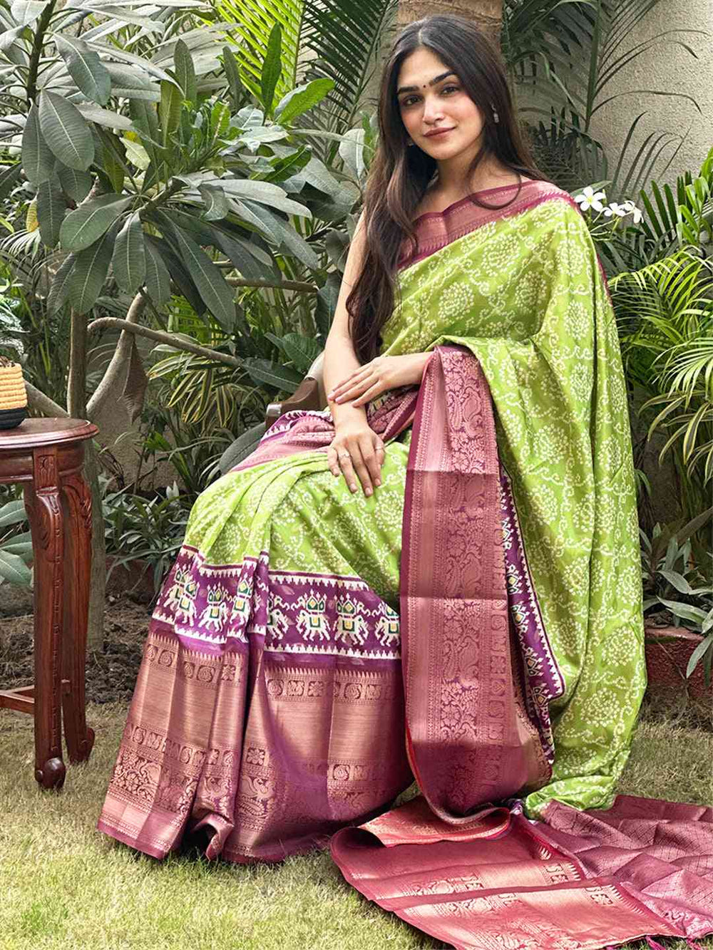 Traditional green Bandhej saree with pink Pattu border