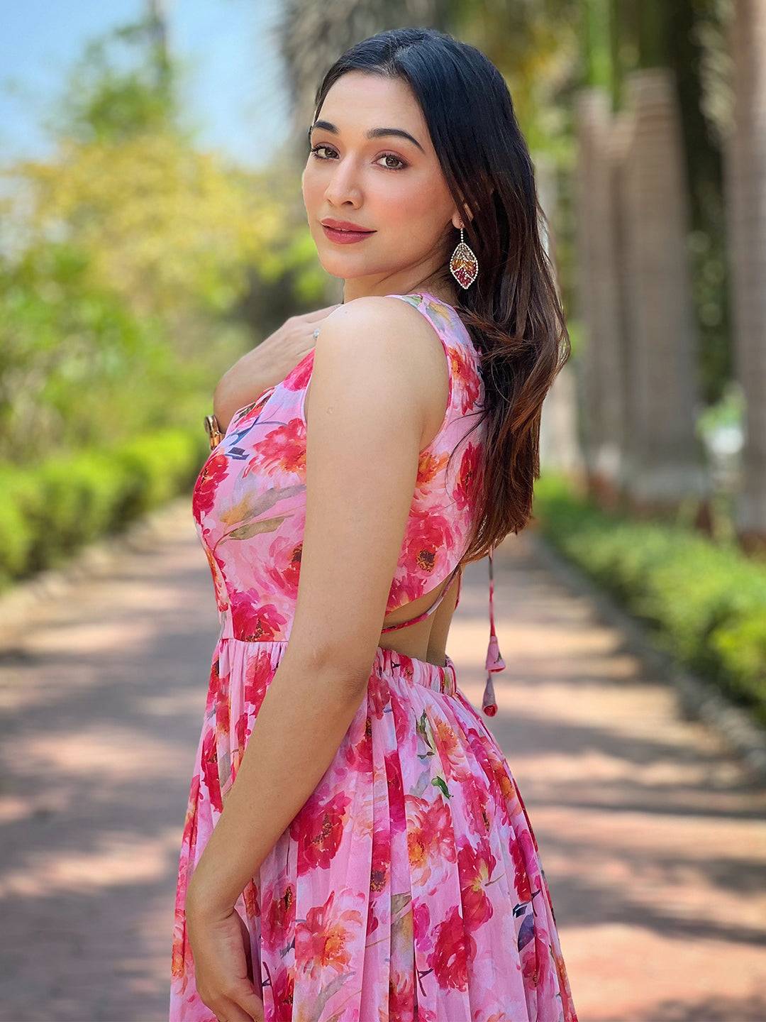 Side view of neon pink floral print dress