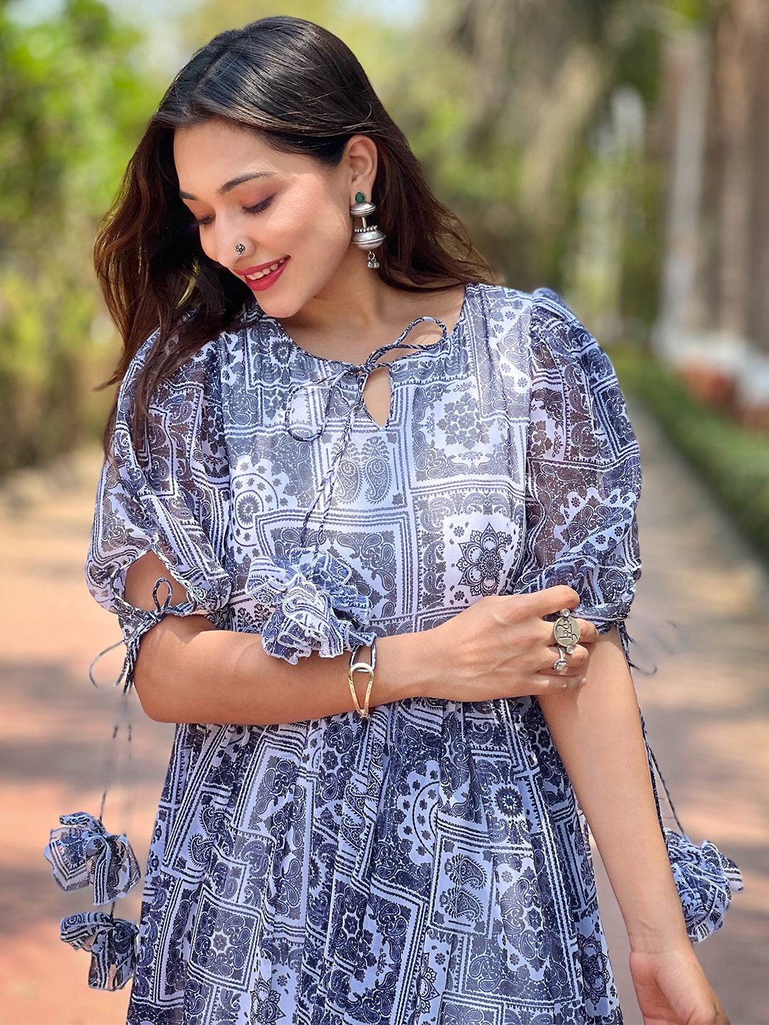 Detailed view of block print dress with accessories