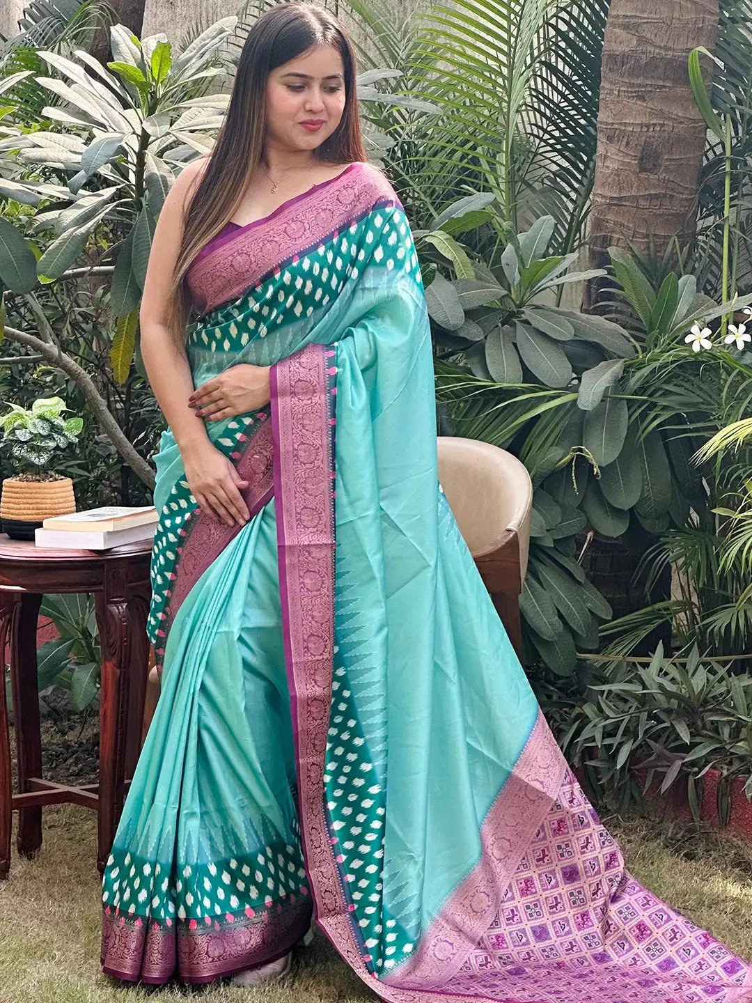Chic Banarasi soft silk saree showcasing a beautiful Patola pallu.