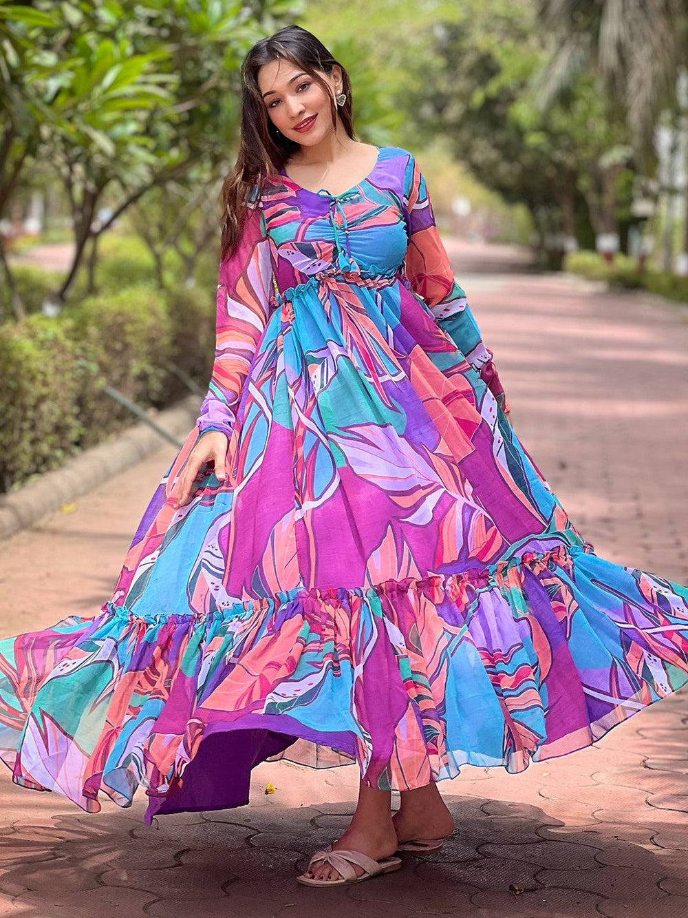 Model twirling in Lust Lavender Abstract Print Dress