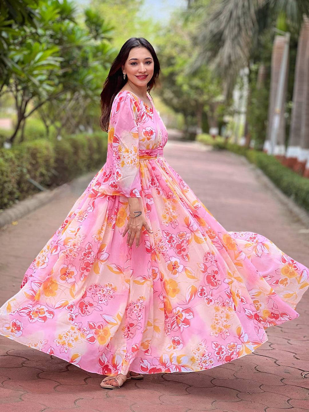 Elegant peach dress featuring abstract floral print