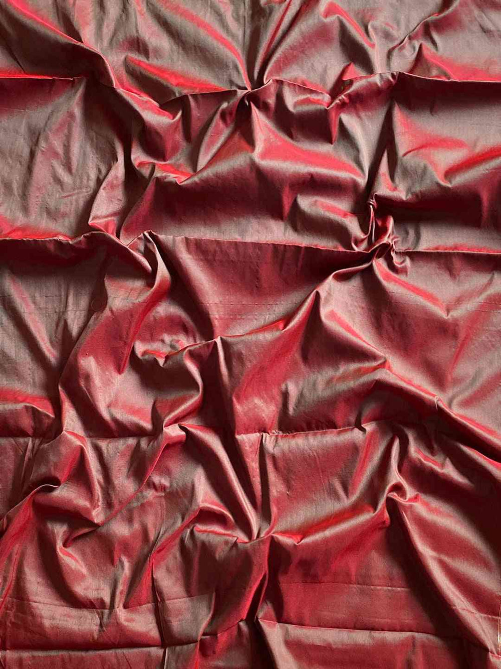 Fabric texture of pink Paithani saree with zari weaving