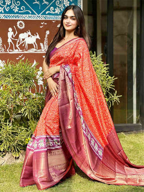 Beautiful orange Bandhej silk saree with detailed Pattu Zari border