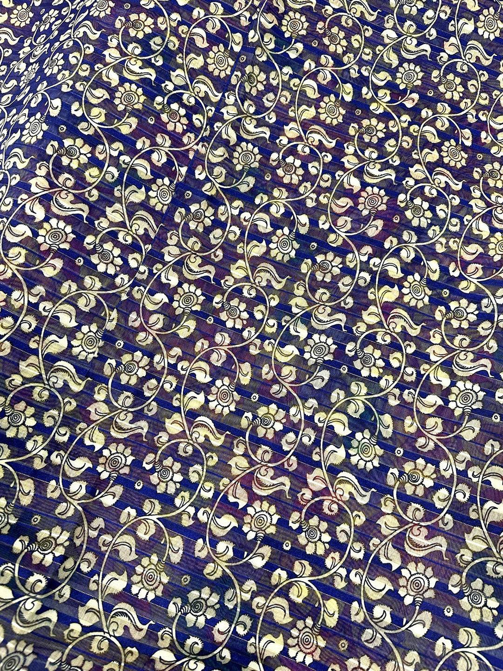 Detailed blue floral pattern on Kalamkari saree