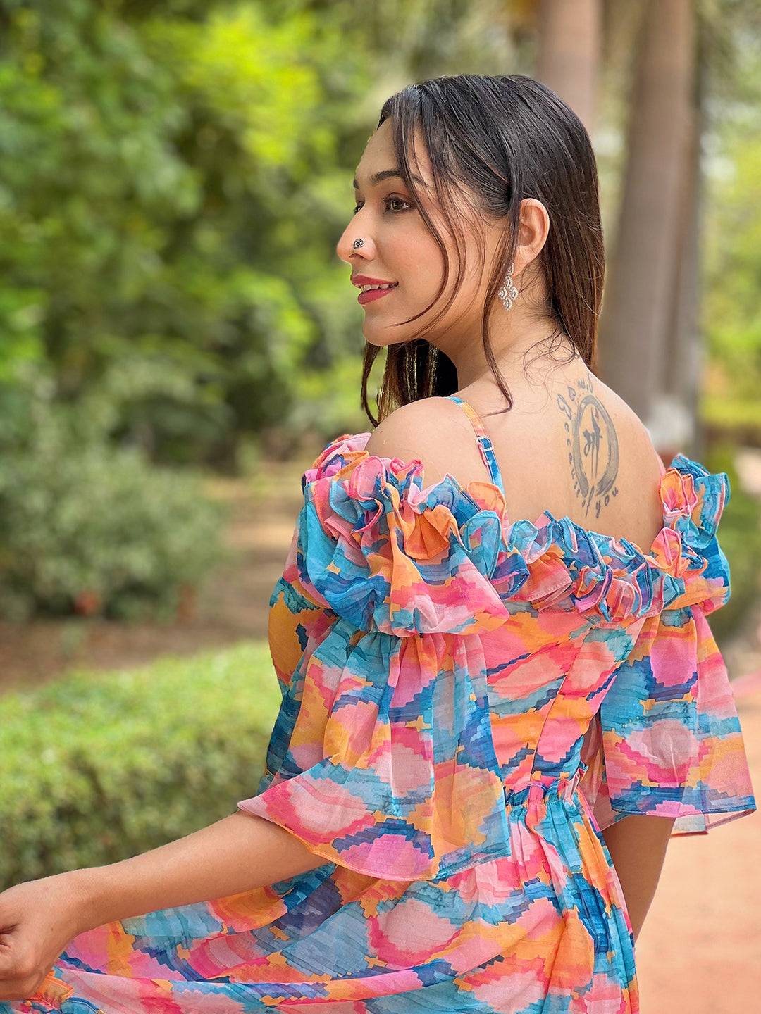 Back view of colorful frill neck dress