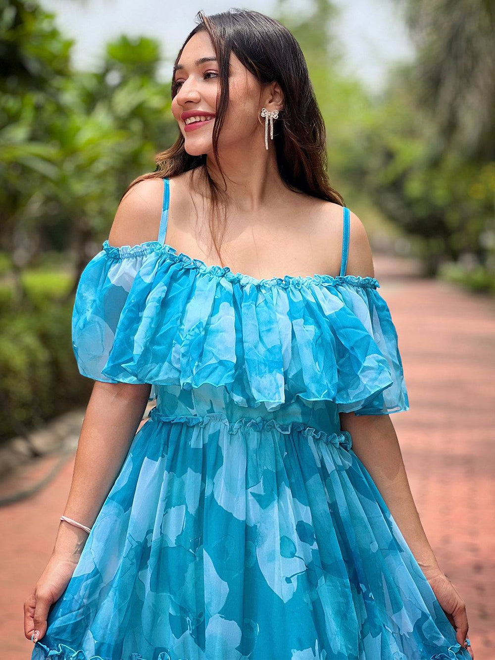 Smiling model in Sky Mist Floral Maxi Dress