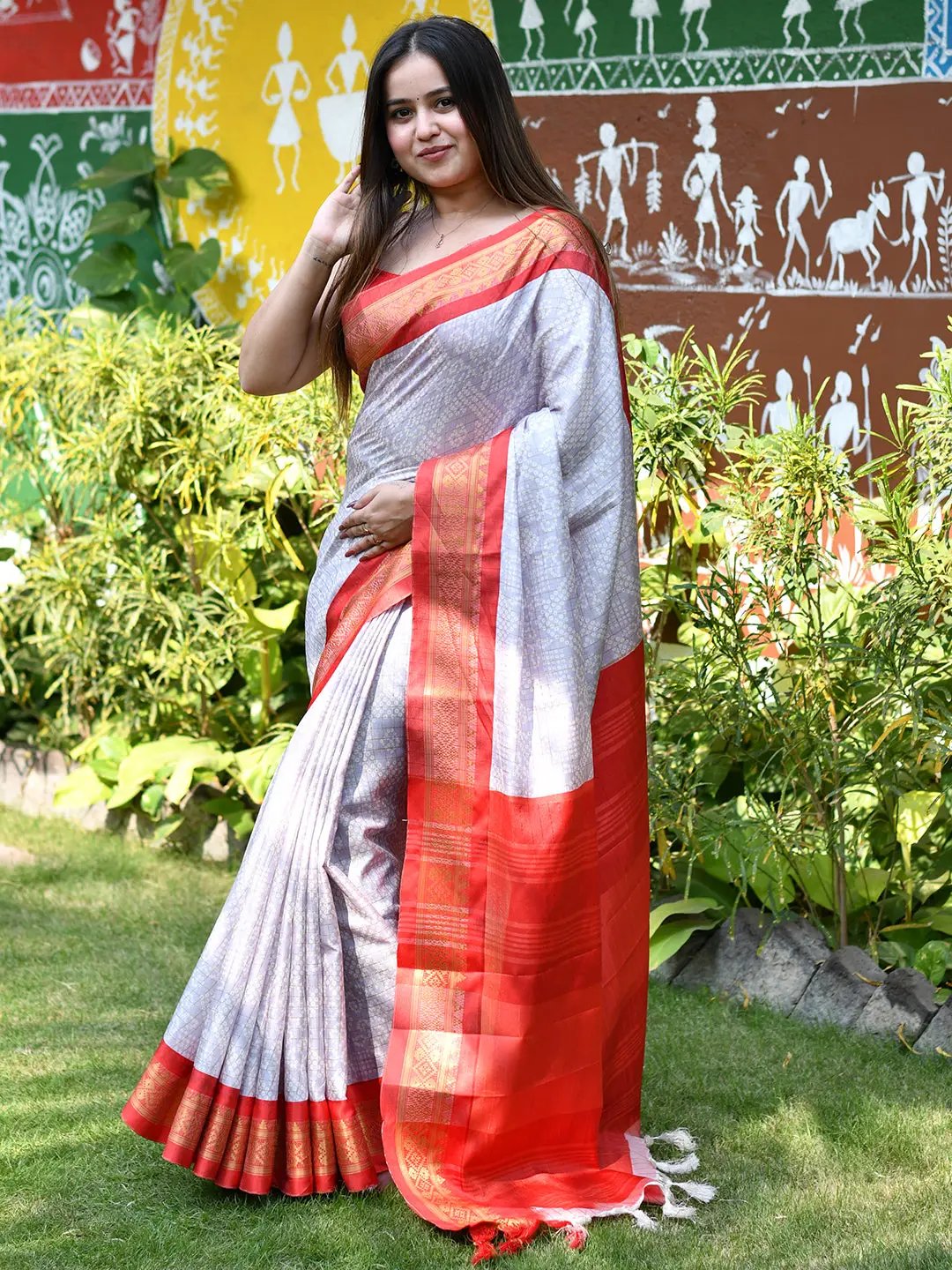 Traditional Bandhani saree with intricate red border