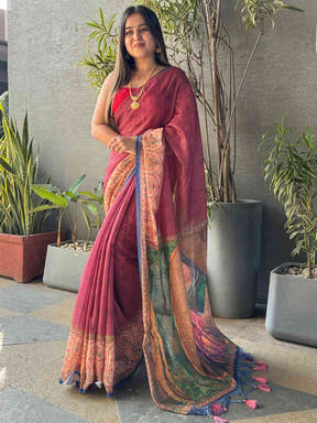 Burgundy Ikkat saree with kalamkari design, standing pose