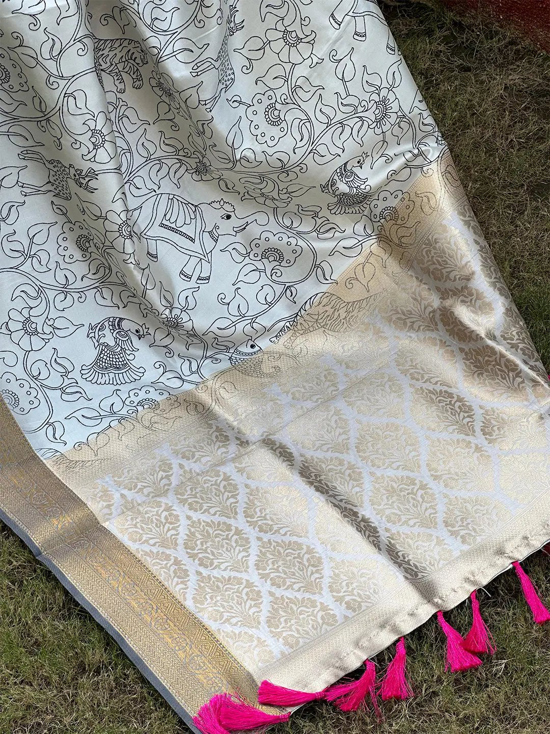 Kalamkari saree with block print and pink tassels