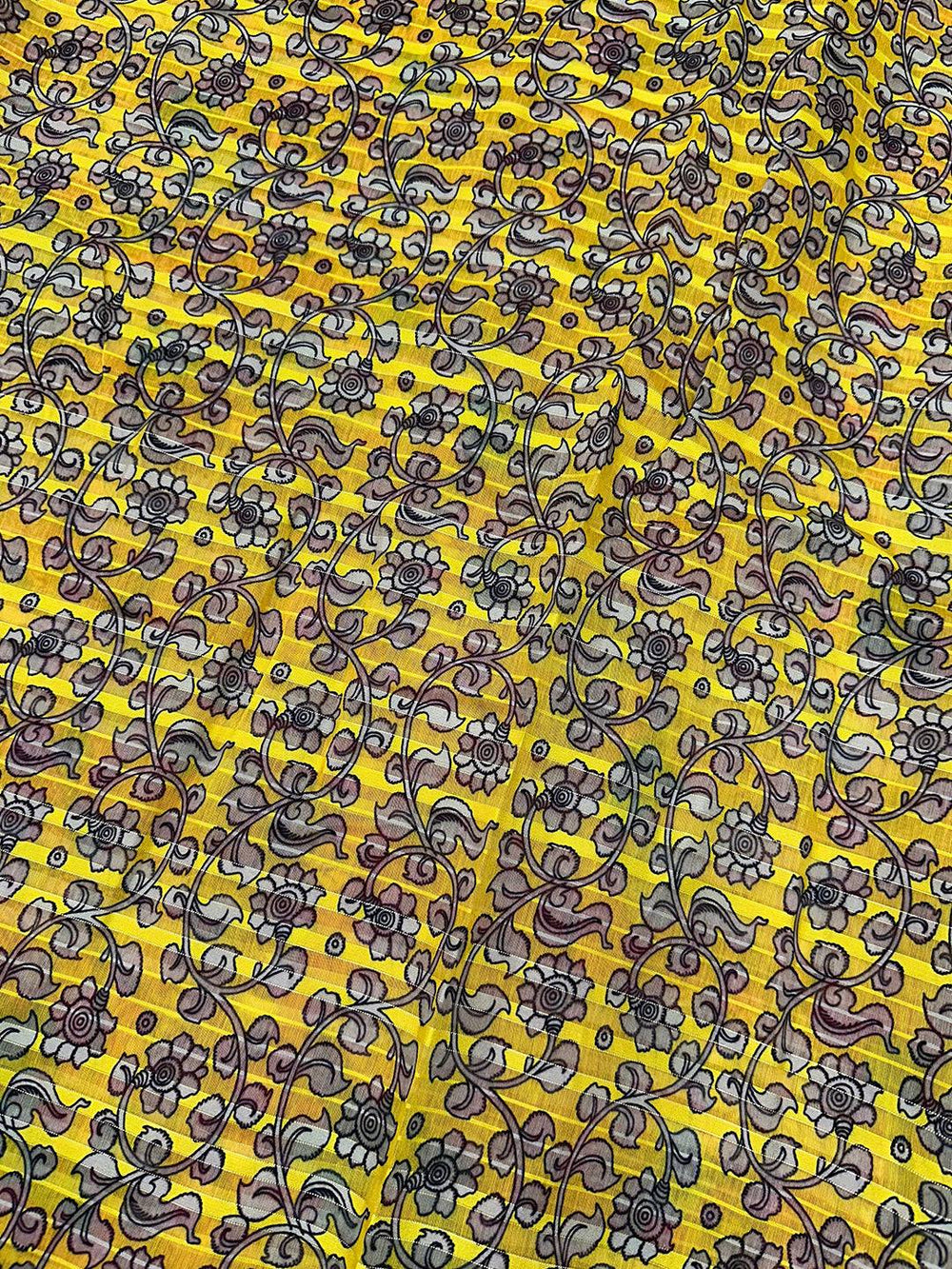 Yellow floral pattern on Kalamkari saree