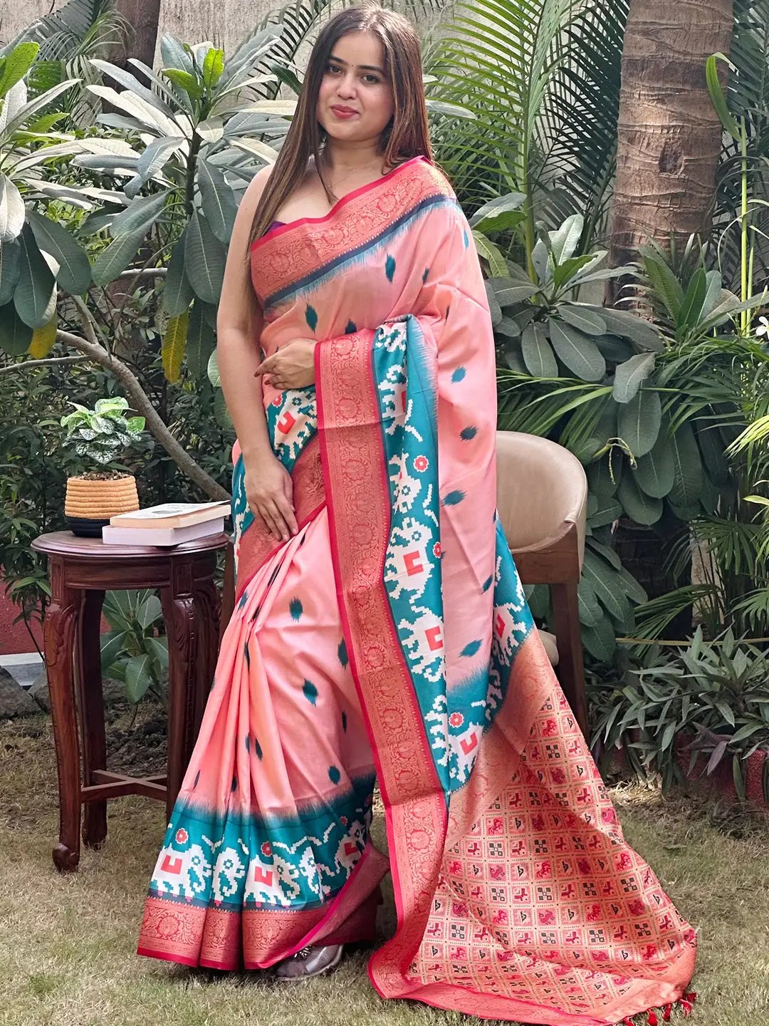 Elegant Banarasi silk saree with intricate Zari Patola pallu