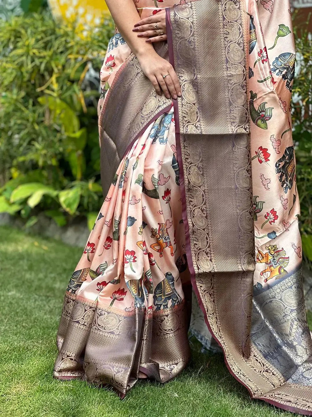 Detailed view of Kalamkari saree fabric and print