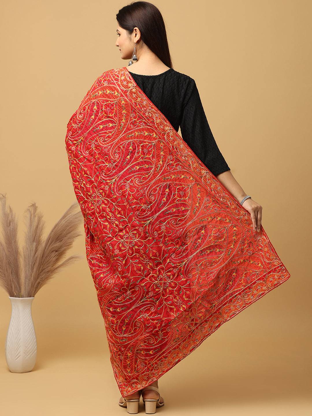 Back view of red poly chiffon dupatta with intricate embroidery