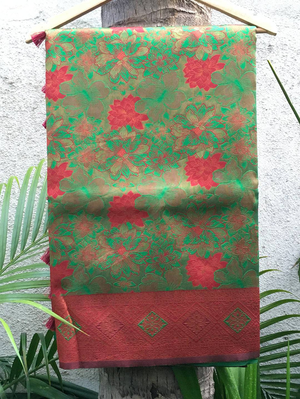 Forest Green Soft Silk Butta Weaving Saree on hanger