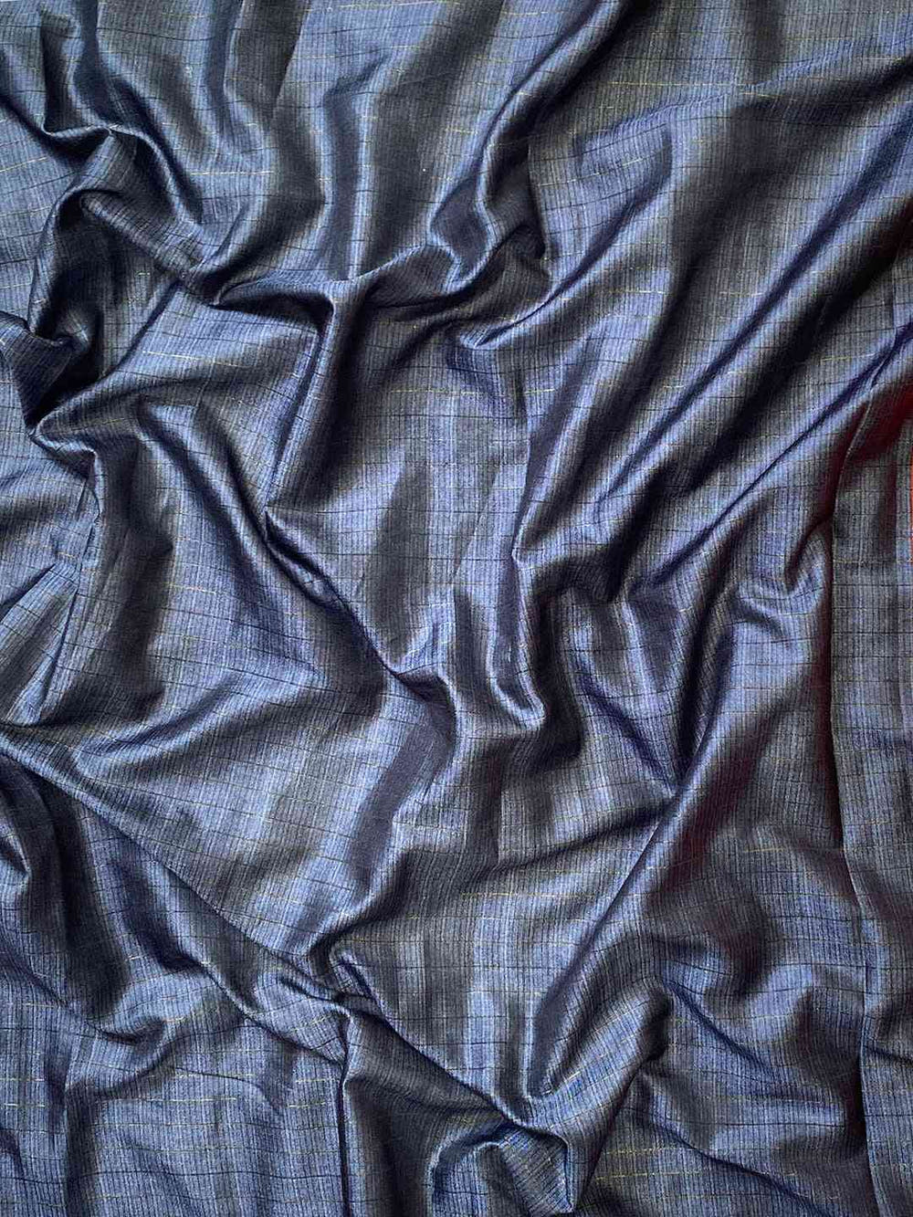 Close-up of soft silk fabric with Bandhej print and texture
