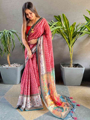 Gajari Ikkat saree with Kalamkari design, model adjusting saree
