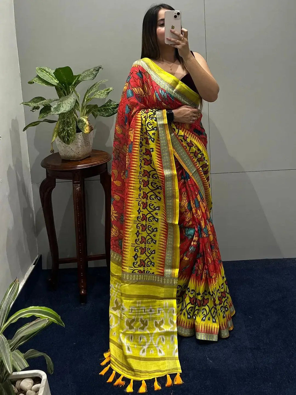 Traditional Ikkat saree with vibrant floral prints