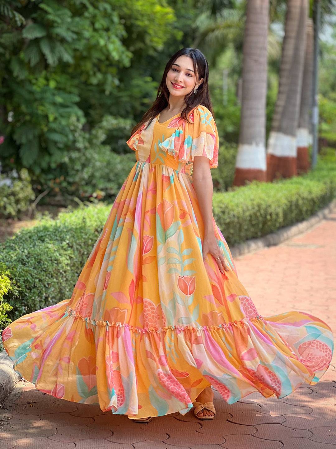 Model twirling in Carnival Yellow V-Neck Dress