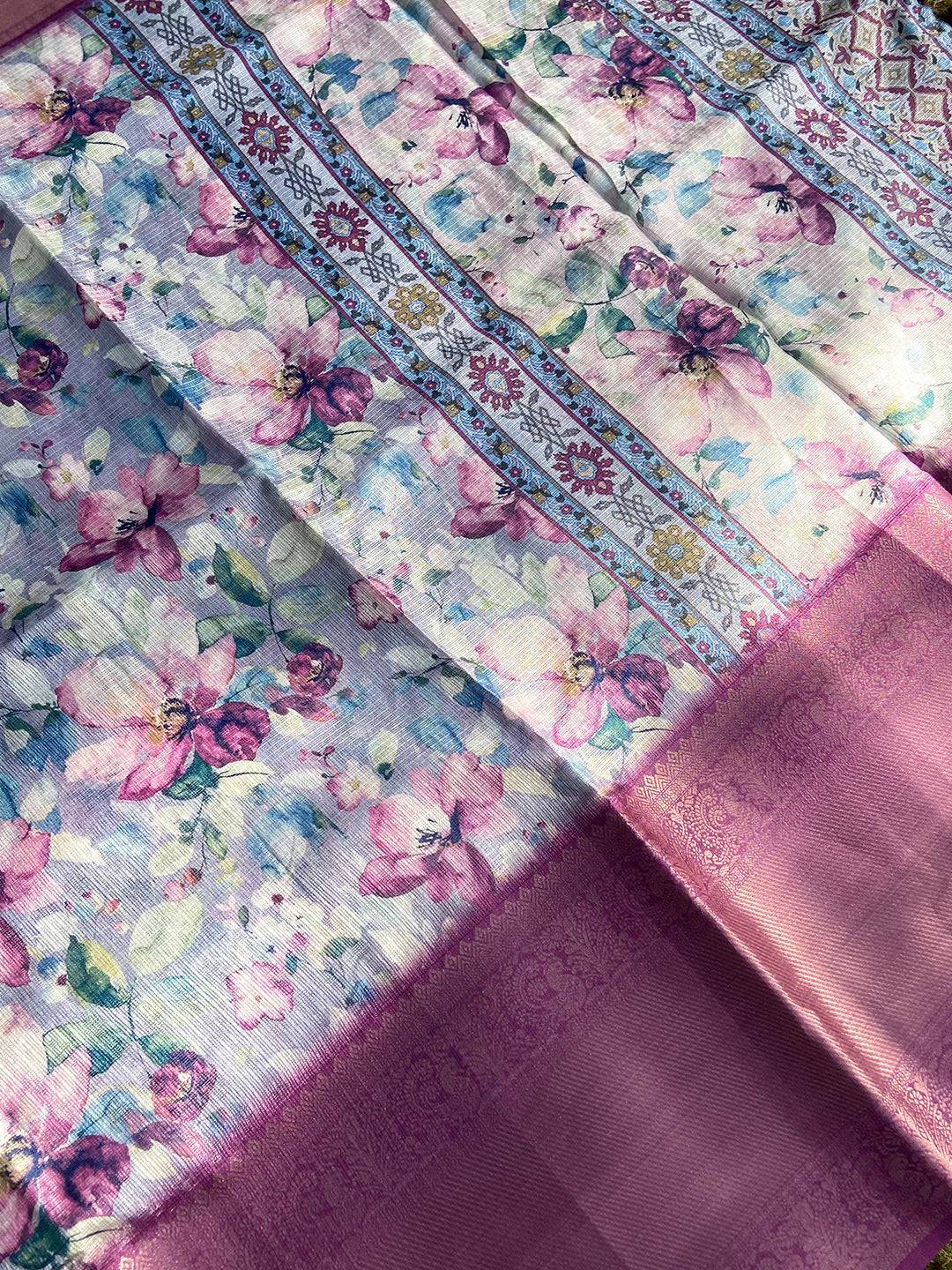 Close-up of lavender saree with intricate floral design and zari