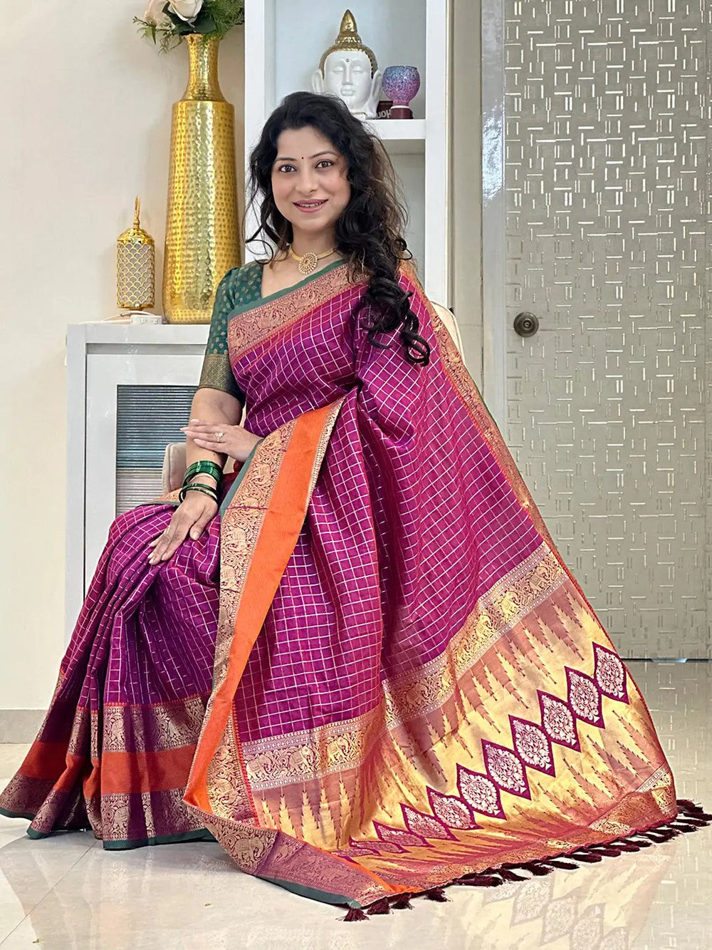 Stunning wine Banarasi silk saree with ornate zari patterns