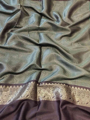 Green Banarasi silk saree fabric with detailed double border design