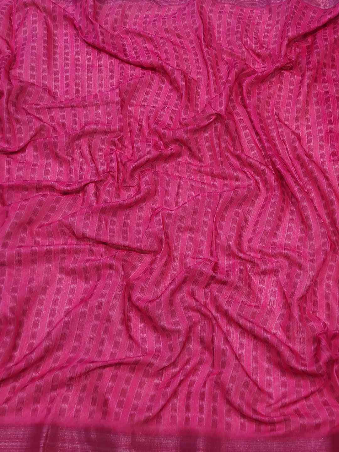 Close-up of pink fabric with striped pattern