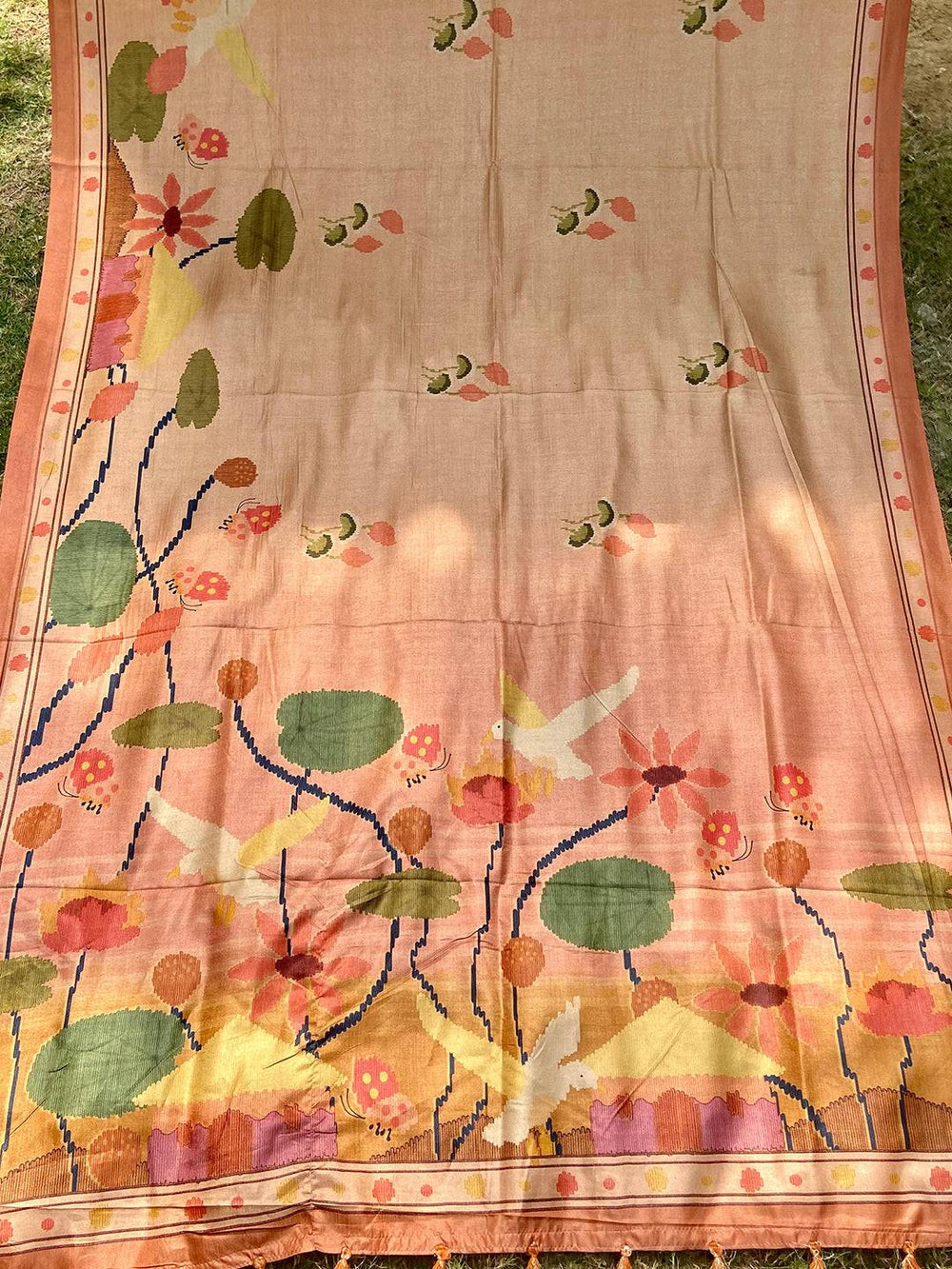 Full view of Brown Tussar Silk Saree with floral Kalamkari patterns