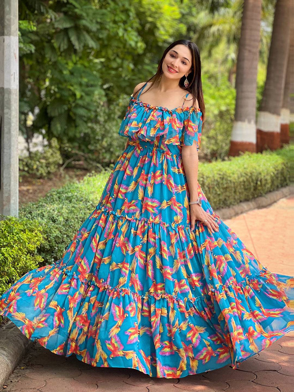 Flowy blue maxi dress with georgette fabric and bird print