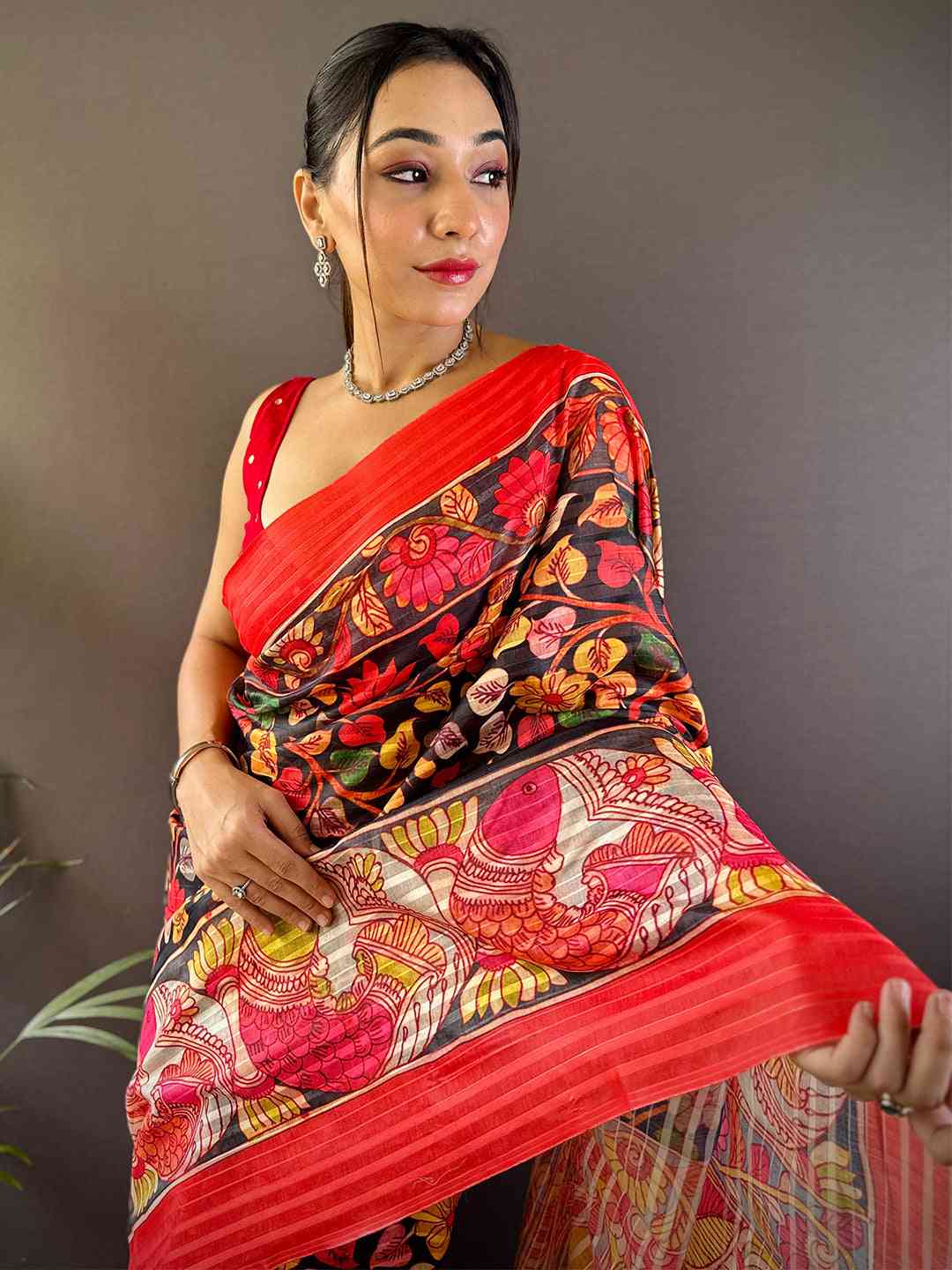 Model wearing Raven Black Pen Kalamkari Linen Saree