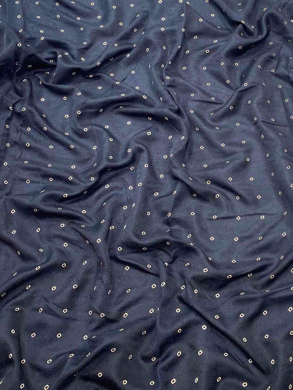 Close-up of Black Manipuri Silk fabric with foil print