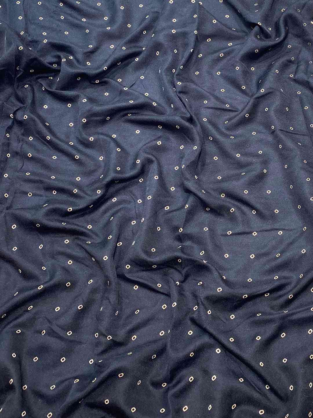 Close-up of Black Manipuri Silk fabric with foil print