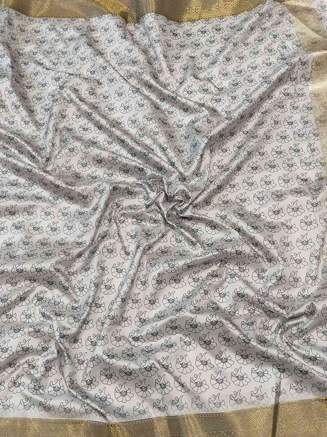 Fabric detail of Kalamkari saree with floral block print