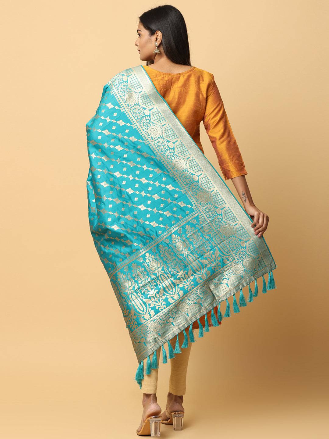 Back view of turquoise woven silk blend dupatta with tassels