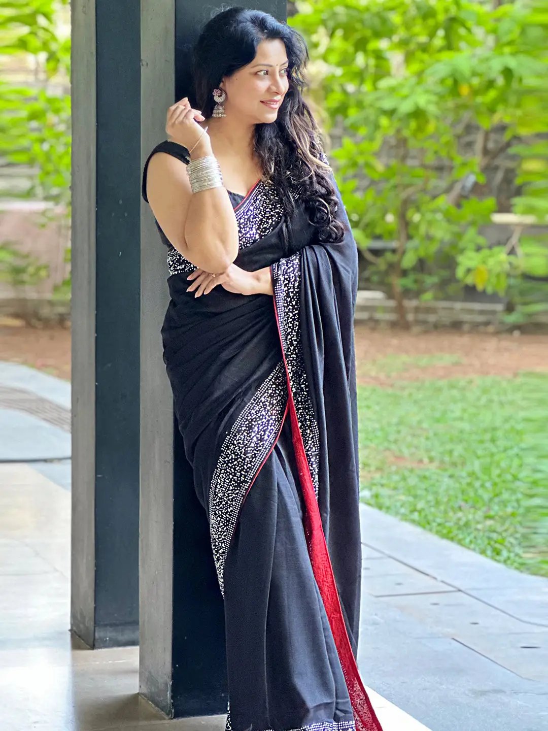 Stylish black saree with intricate embroidery details