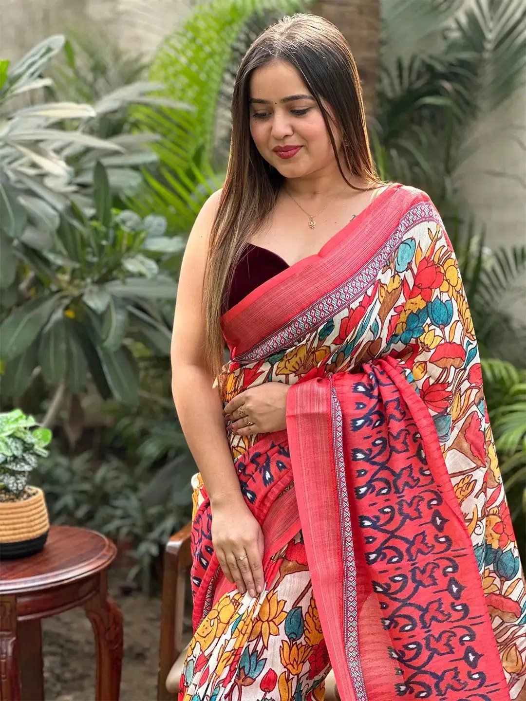 Model in Floral Ikkat Saree with intricate patterns